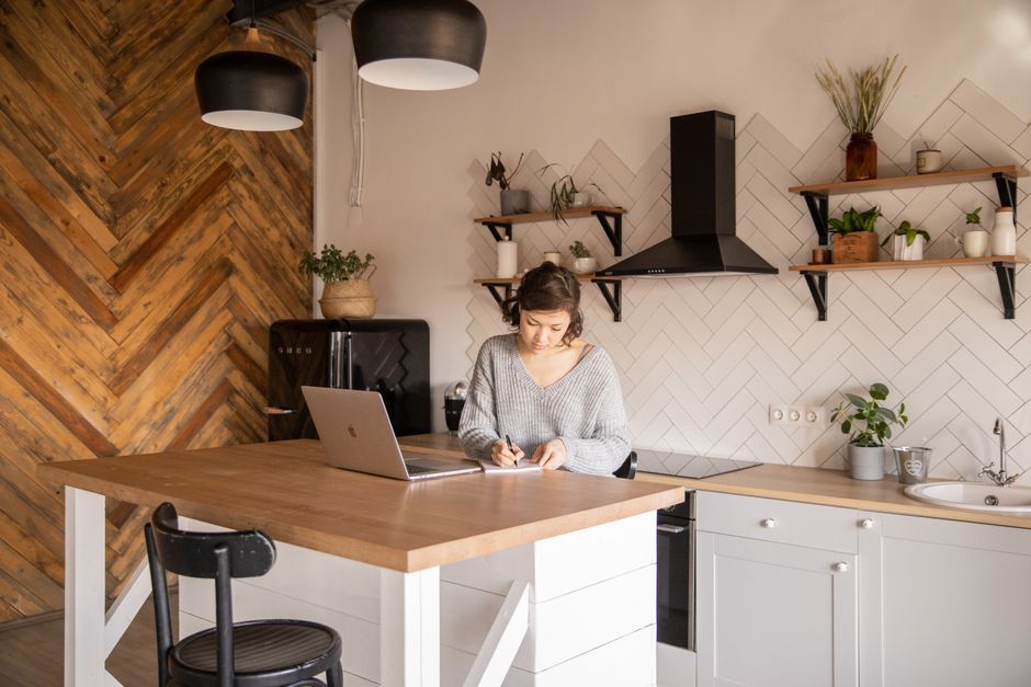 Kitchen designer working on custom cabinet plans